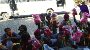 ecstatic kids with christmas gifts